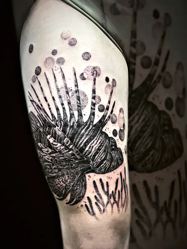 Lionfish tattoo by Damián Calandra