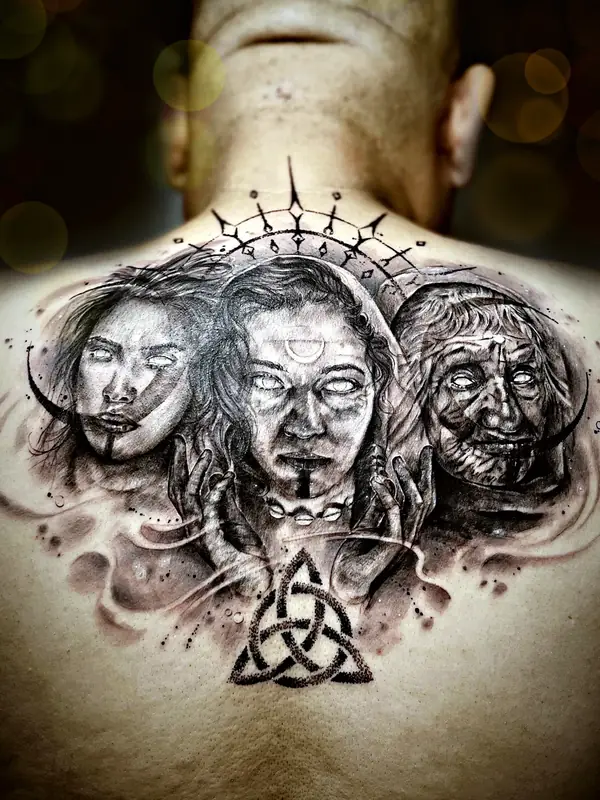 Three faces back piece tattoo by Damián Calandra