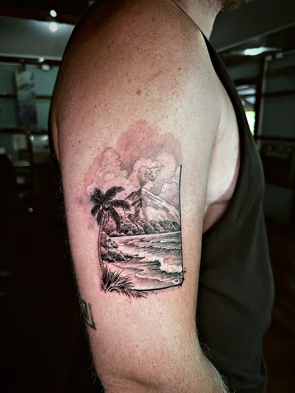 Beach scene with palm tree tattoo by Damián Calandra