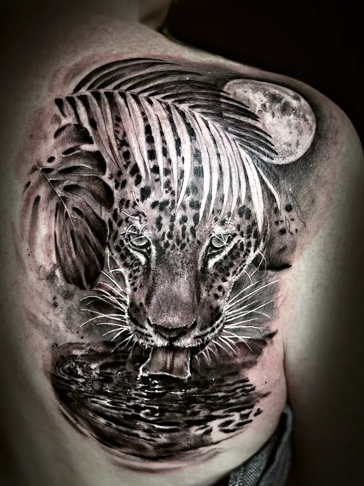 Jaguar drinking under the moon tattoo by Damián Calandra