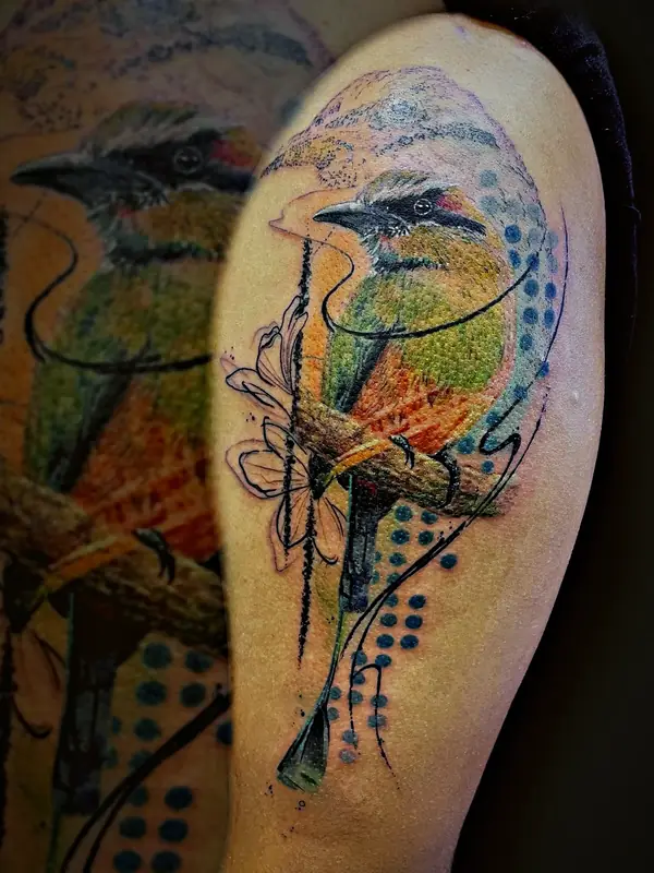 Tropical bird with abstract strokes tattoo by Damián Calandra