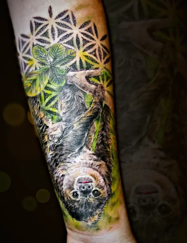 Sloth with sacred geometry tattoo by Damián Calandra