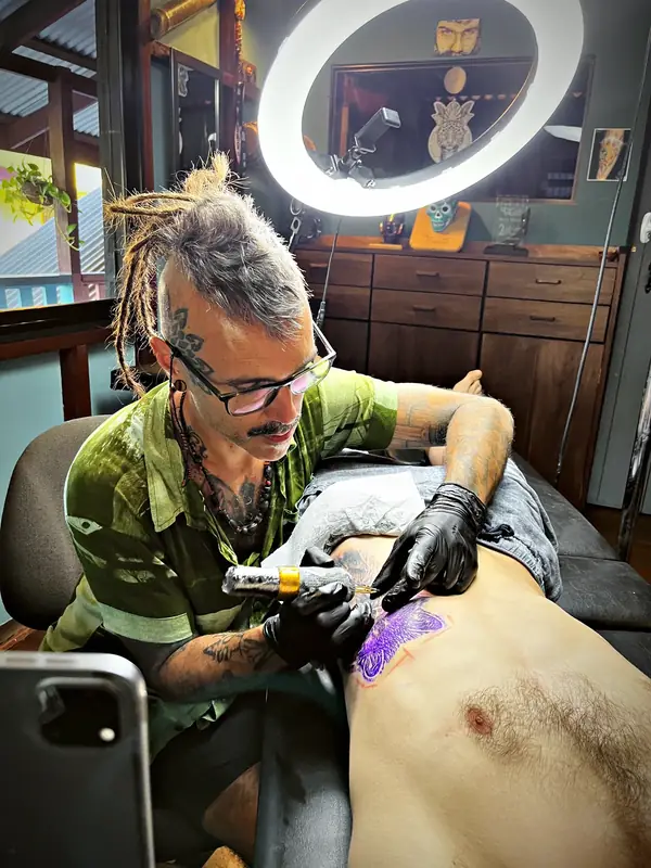 Damián working on a chest piece