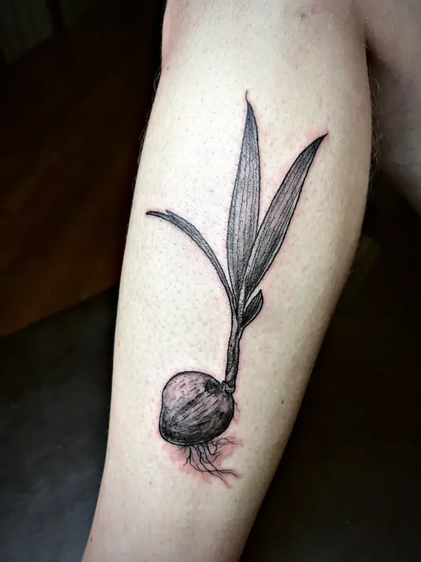 Sprouting coconut, black and grey tattoo by Damián Calandra